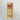Buci Hard Kombucha can with ginger and lemon flavor on a white background